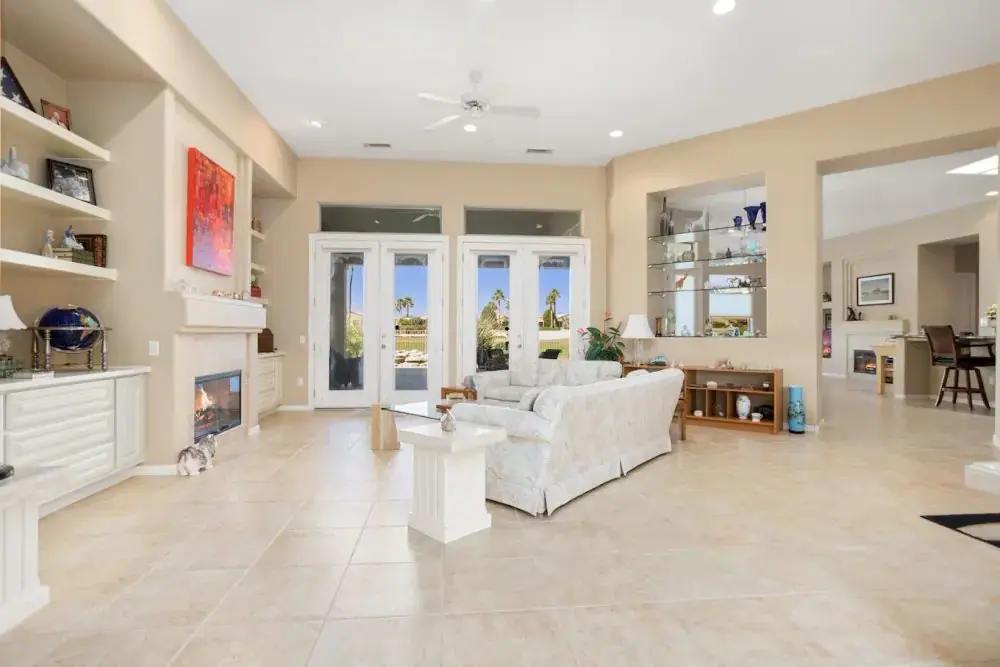 Bright great room with a fireplace and tile floors, a home to check with the Arizona Buyer Advisory